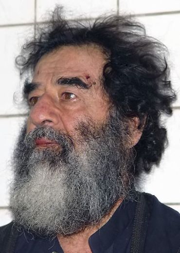 bearded Saddam Hussein after capture